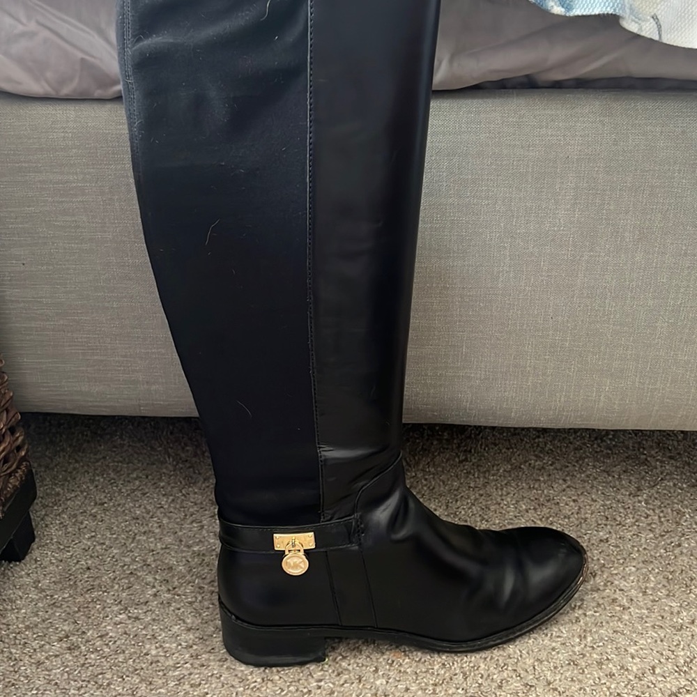 Michael Kors riding boots.